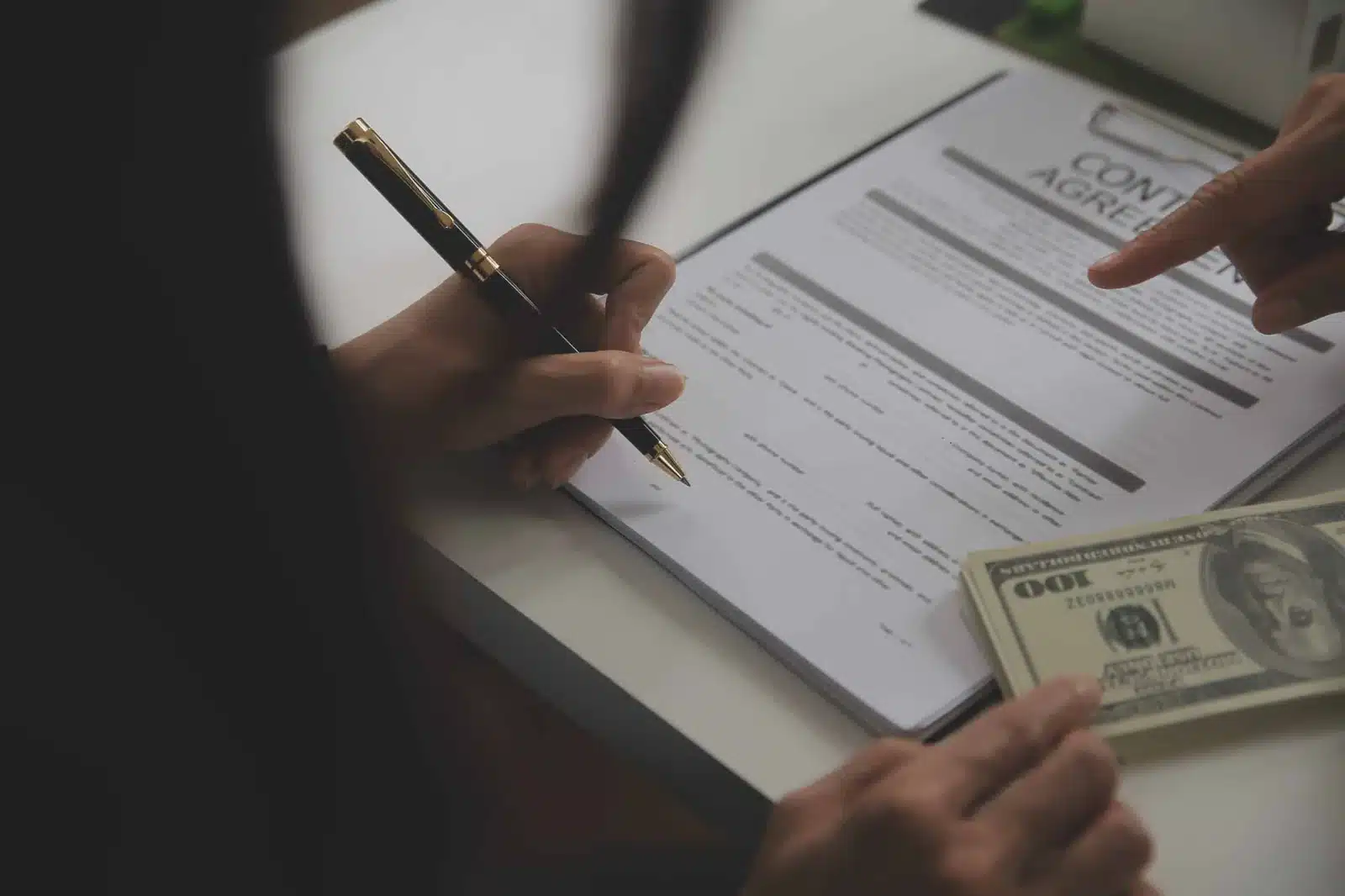 Nevada client signing a prepared deed before it is submitted for county recording