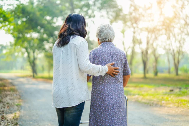 Adult daughter helping her mother at home after signing a Nevada power of attorney for health care